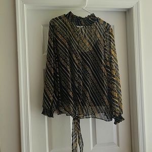 Black sheer blouse with gold chain design